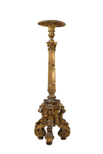 Importante torchère en bois sculpté et doré,...