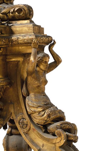 Importante torchère en bois sculpté et doré,...