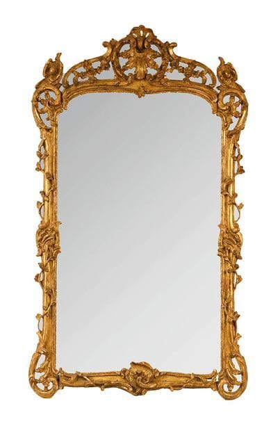 Miroir en bois et stuc dorés à pare-closes...