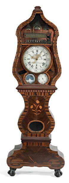 Horloge de parquet à musique de forme violonée...