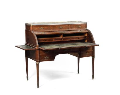 Bureau cylindre toute face en acajou et placage...
