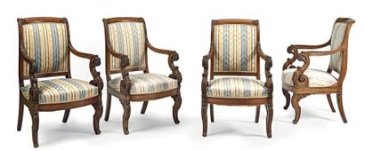 Série de quatre fauteuils en acajou massif,...