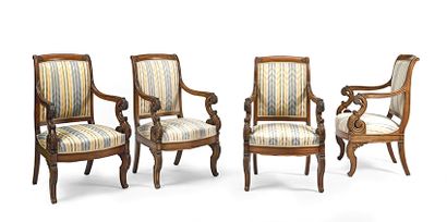 Série de quatre fauteuils en acajou massif,...
