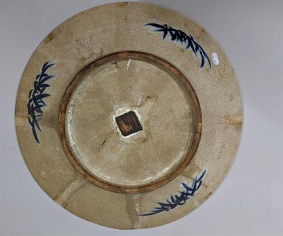 Grand plat en porcelaine à décor bleu - NANKIN,...