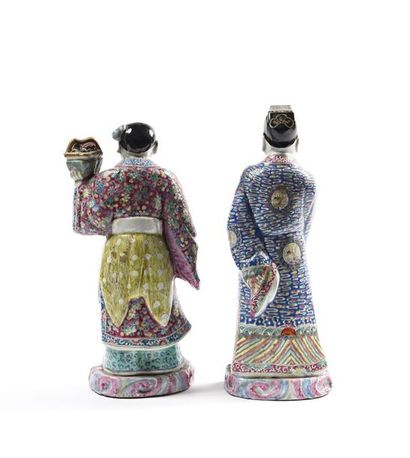 Deux statuettes de personnages en porcelaine...