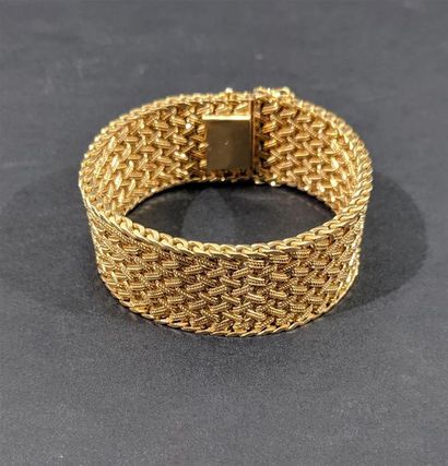 Bracelet en or jaune 18 K (750/oo) à décor...