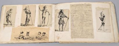 Carnet à dessins et papiers découpés comprenant...