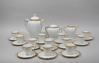 LIMOGES

Service de table en porcelaine blanche...