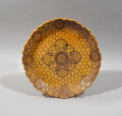 Earthenware plate with contoured edges and...