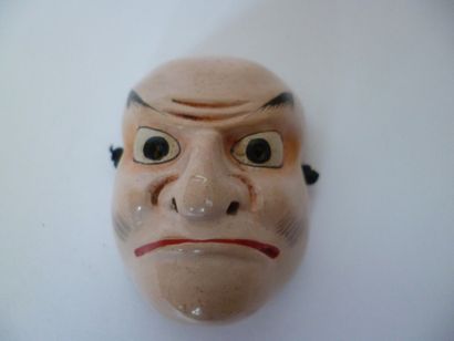 Miniature lacquered NO theatre mask forming...