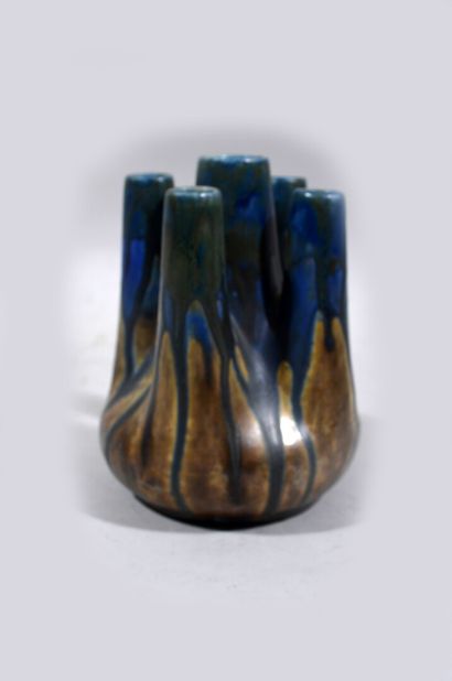 Gilbert METENIER (1875-?)

A flamed enamelled...