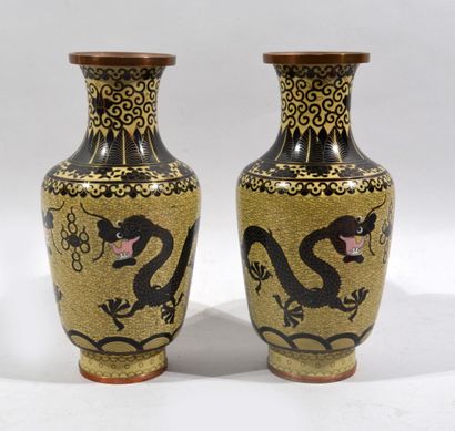 A pair of green, pink and black cloisonne...