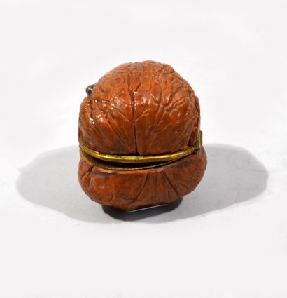 Brass mounted nut containing two miniature...