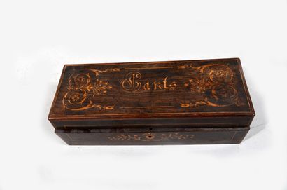 Small glove box inlaid with stylized foliage...