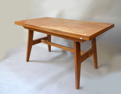 Modern rectangular table resting on four...