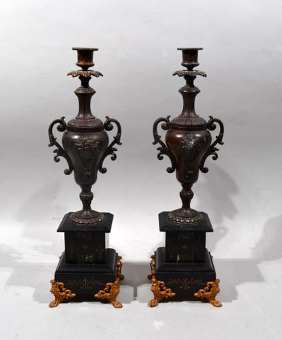 Mantelpiece including a black marble clock...