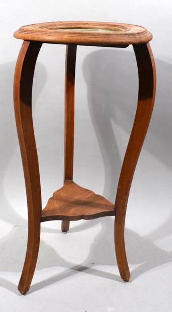 A small moulded wooden pedestal table with...