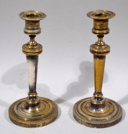 Pair of silver plated torches decorated with...