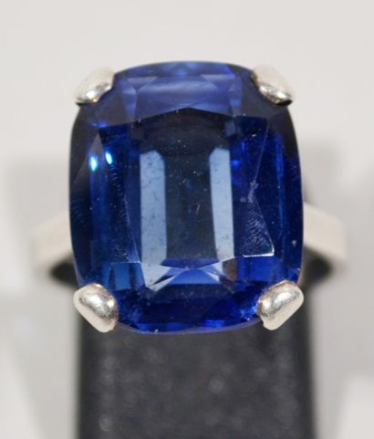 Silver ring set with a blue violet princess...