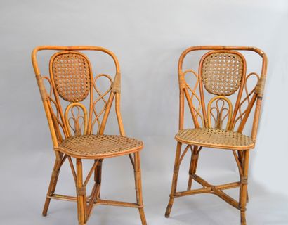 DRUCKER HOUSE

Twelve outdoor chairs in woven...