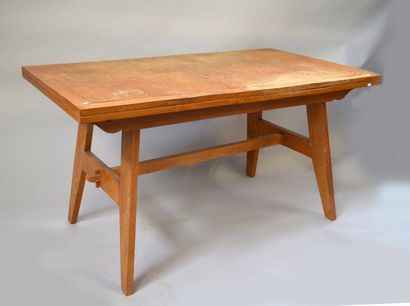 Modern rectangular table resting on four...