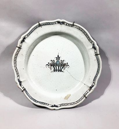A large blue and white enamelled earthenware...
