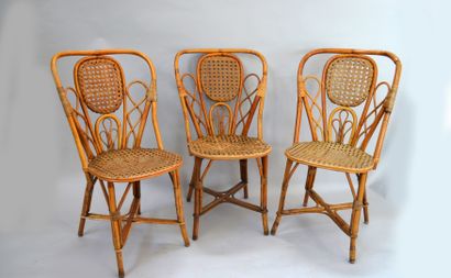 DRUCKER HOUSE

Twelve outdoor chairs in woven...