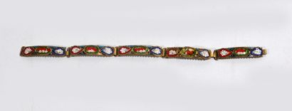 BRACELET of articulated brass plates decorated...