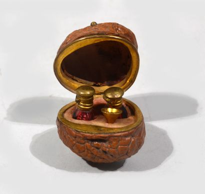 Brass mounted nut containing two miniature...