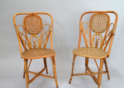 DRUCKER HOUSE

Twelve outdoor chairs in woven...