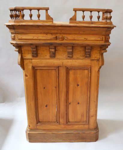 Carved and molded pine counter with a gallery...