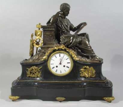 Bronze clock with double patina, the round...