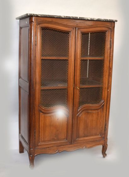 Small natural wood bookcase opening with...