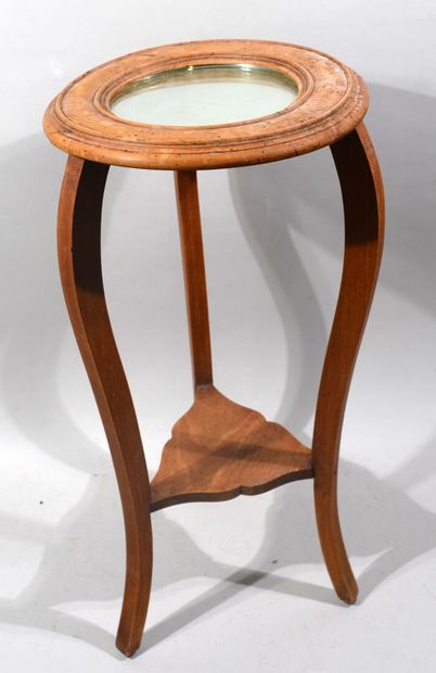 A small moulded wooden pedestal table with...