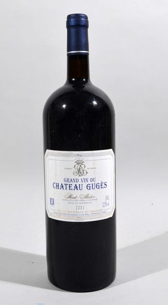 Une bouteille de CHATEAU GUGES Haut Médoc...