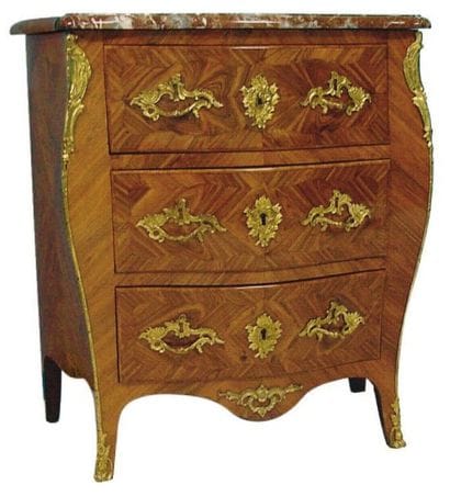 COMMODE en bois de placage marqueté ouvrant...