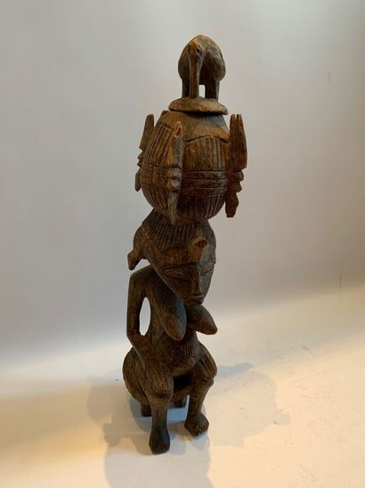 Style SENOUFO, Côte d'Ivoire.

FIGURE ASSISE...