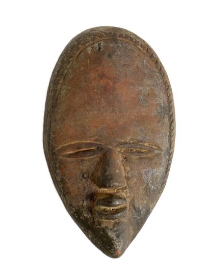 Type DAN, Côte d'Ivoire.

PETIT MASQUE en...