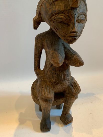 Style SENOUFO, Côte d'Ivoire.

FIGURE ASSISE...