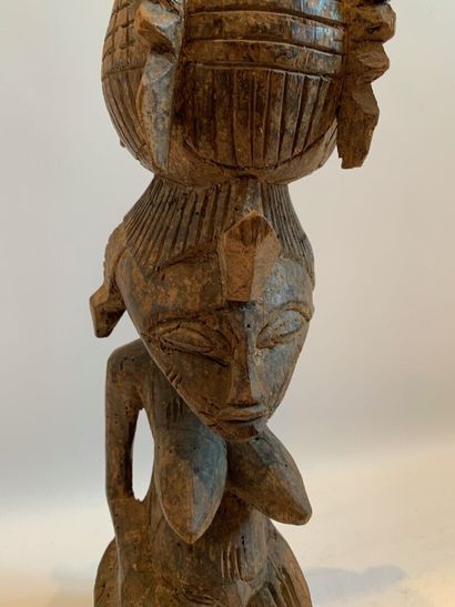 Style SENOUFO, Côte d'Ivoire.

FIGURE ASSISE...