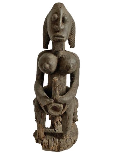 Dans le style DOGON, Mali.

FIGURE FEMININE...