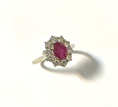 BAGUE en or blanc et jaune 18k (750/1000e)...