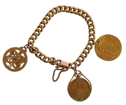 Bracelet gourmette en or jaune 18 K (750/oo)...