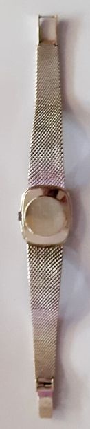 OMEGA

Montre de dame en or gris à cadran...