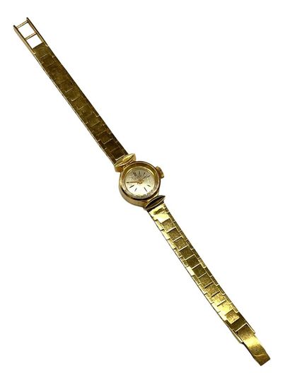 TISSOT - Montre bracelet de dame en or jaune...