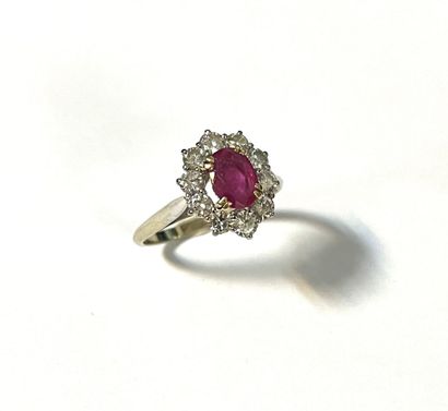 BAGUE en or blanc et jaune 18k (750/1000e)...