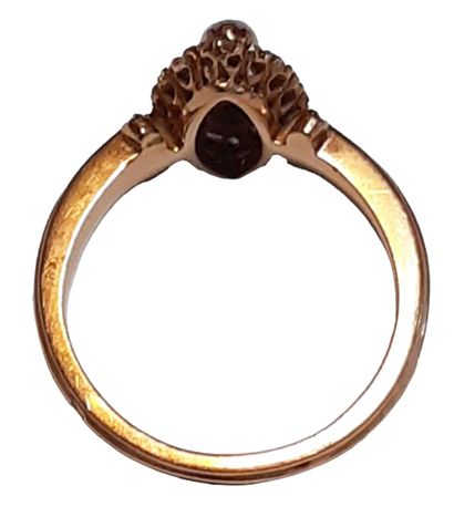 BAGUE en or rose 18K (750/1000e) à plateau...