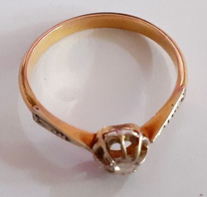 BAGUE en or gris et jaune 18K (750/1000e)...