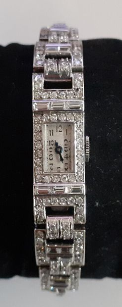Montre bracelet de dame en or blanc 18 K...