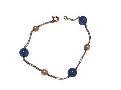 BRACELET en or jaune 18K (750/1000e) à décor...